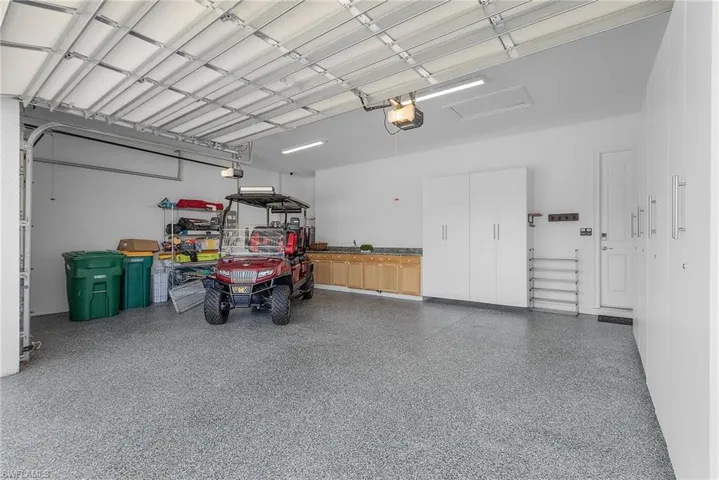 3 Car Garage with storage and work bench