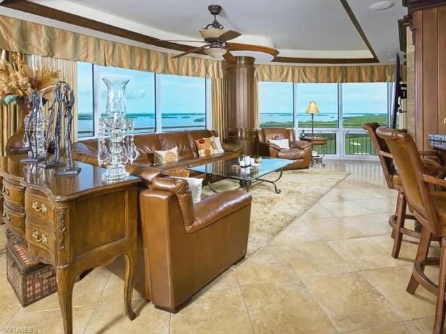 Large family room open to kitchen and dining, overlooking the west side of the unit.