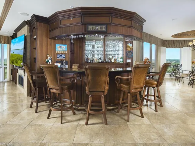 Prepare a drink at the bar just before sunset. This will be your "happy"-est hour!