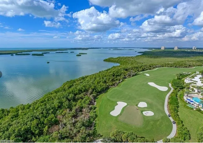 It is ALL about the VIEW! This sky home is located in the prestigious Azure building of Bonita Bay.