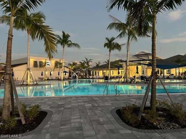 Community pool featuring a patio area