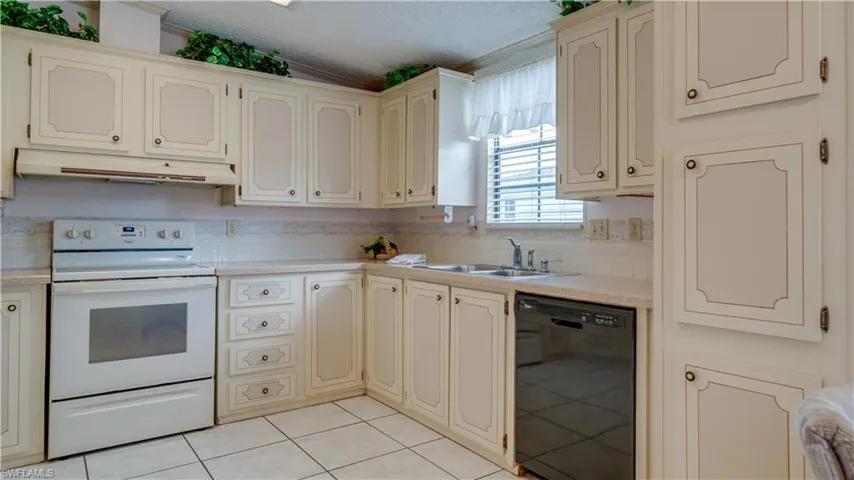 Well maintained cabinetry and countertops.The kitchen window is a bonus.