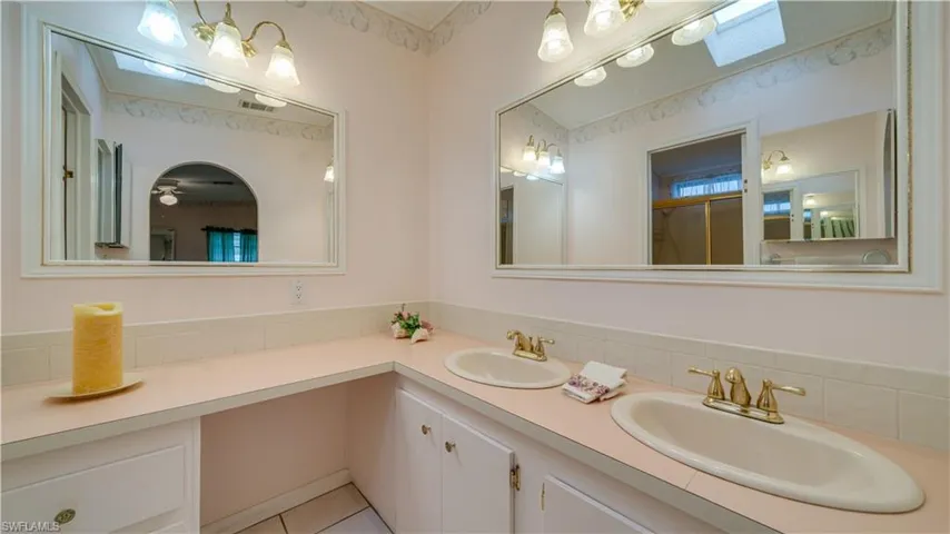 Room for two? Absolutely. The master bath features dual sinks and an extra large counter.