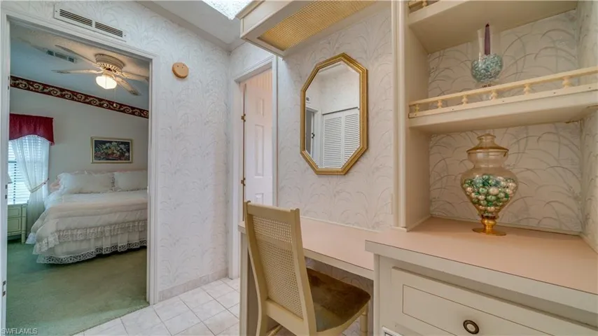 Guests will make themselves at home in their private retreat. Looking for an office? This space is steps from the kitchen area. Want an inside laundry? It's here. Tucked behind closing doors.