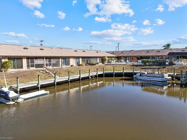 Dock featuring a water view