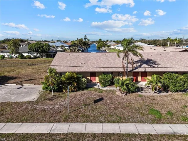 View of front of property featuring roof with shingles