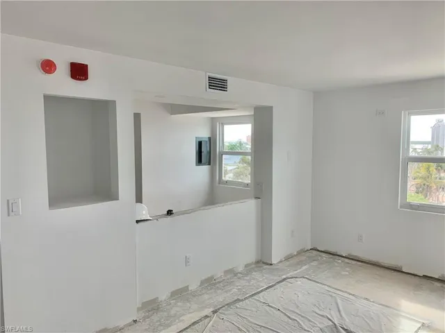Empty room featuring electric panel