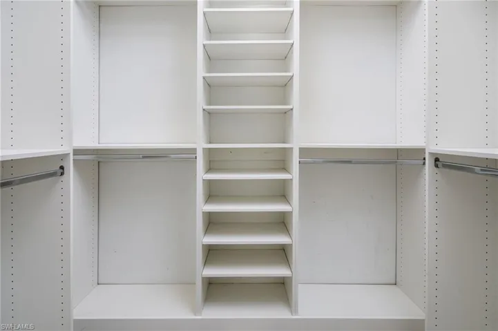 Custom closet systems in all of the bedrooms featuring shelving and hanging rods
