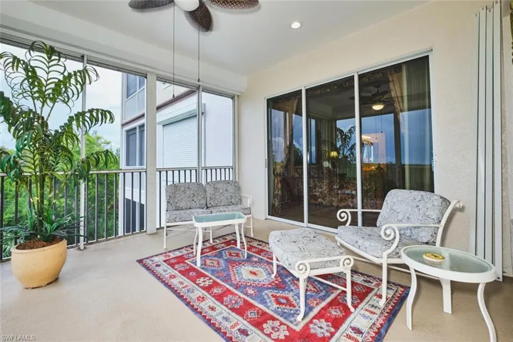 Sunroom featuring carpet flooring and recessed lighting
