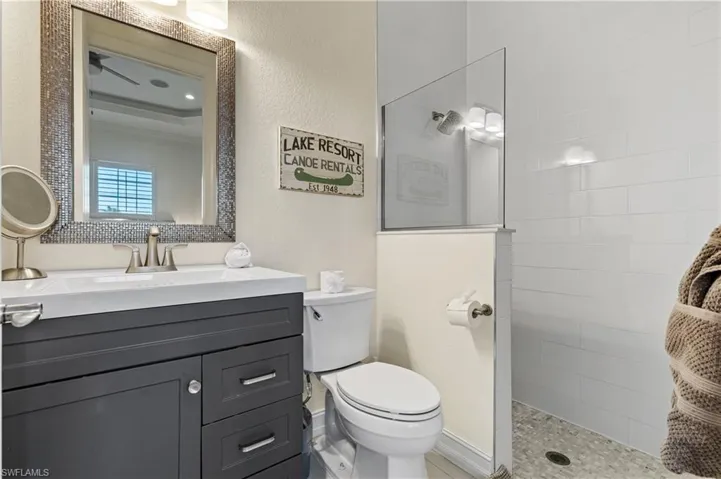 Full bathroom walk in shower and vanity