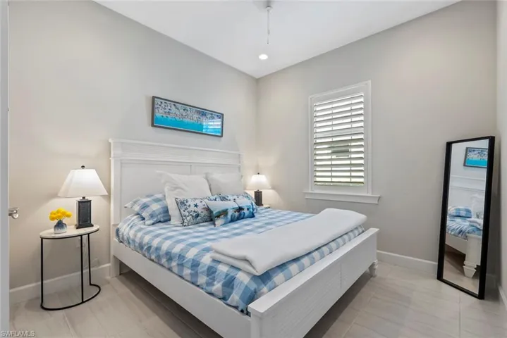 Bedroom featuring baseboards and recessed lighting