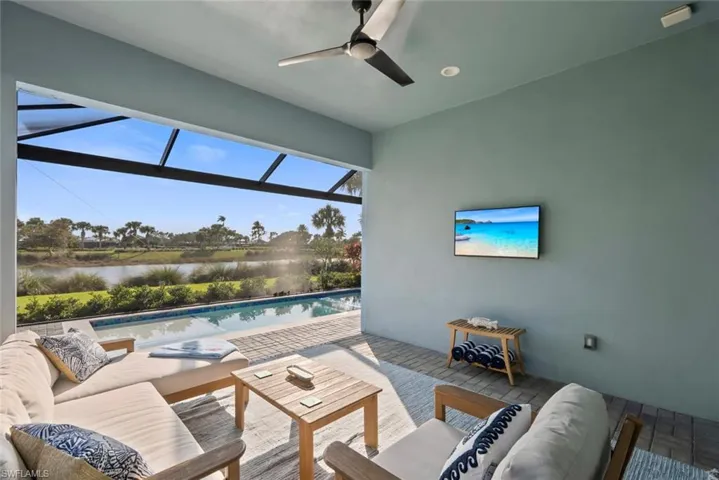 View of patio with an outdoor living space.