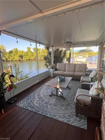 Attached screen room, view of water and trek flooring