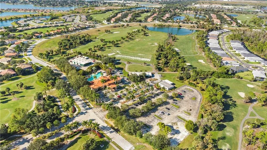 Aerial view of property's location with nearby suburban area