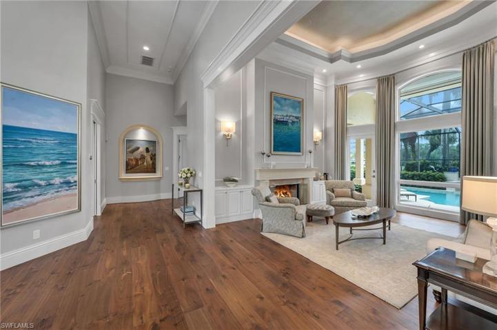 The main hallway leads between the kitchen and family room, to the Primary Suite, past the dining room and large office.  Such details everywhere one looks!