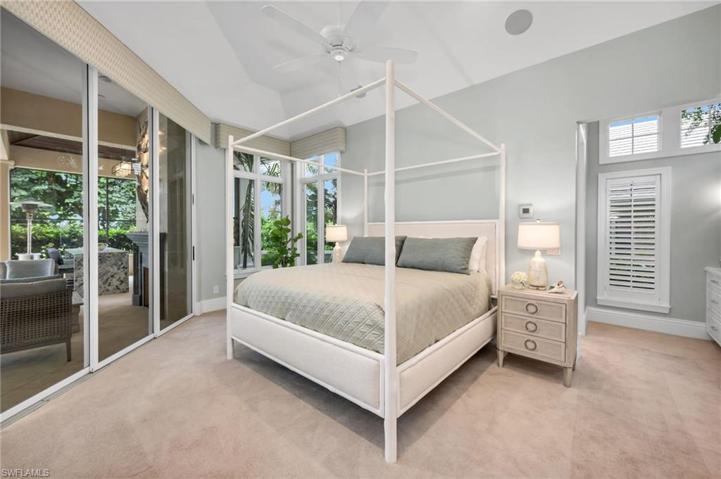 This spacious guest suite overlooks the fireplace lounge area and the pool, with plenty of space to make your guests feel right at home.
