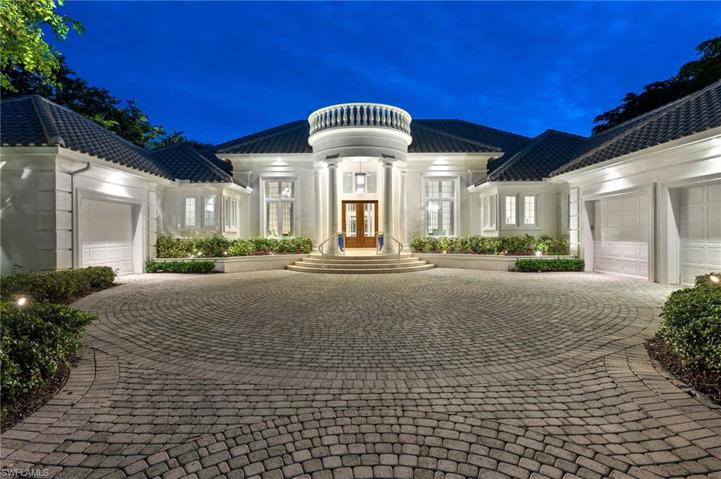 This home has a new roof, beautiful landscape lighting to show off it's grandeur, and a great location to the Club.
