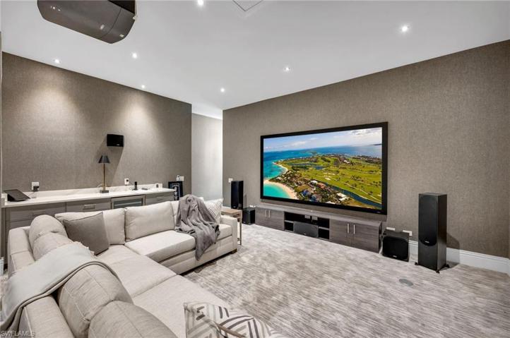 Imagine the golf and football parties you could host...wine refrigerator is ready in the bar!