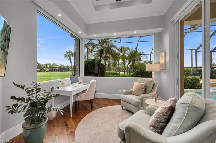 The large sitting area of the Primary Suite has been thoughtfully decorated into Her Office, with the most incredible views to inspire creativity.  Or...curl up in your comfy chairs with a book!