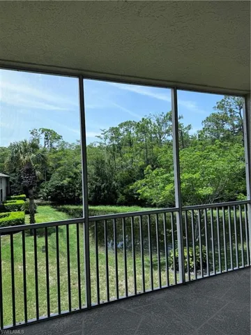 Unfurnished sunroom featuring a healthy amount of sunlight