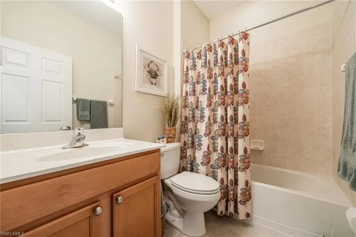 Full 2nd bathroom with vanity, toilet, and shower / tub combo