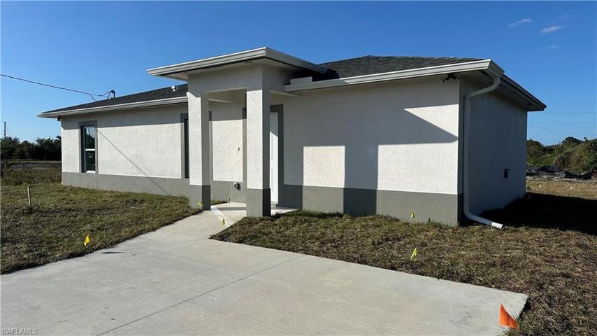 323 Poplar, LEHIGH ACRES FL 33974
