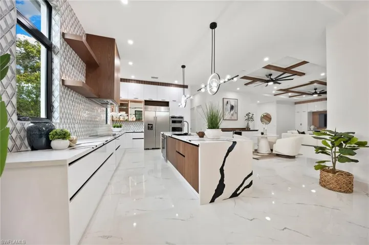 This modern contemporary masterpiece showcases a dramatic open floor plan with 4,730 square feet under air of bright, airy living space