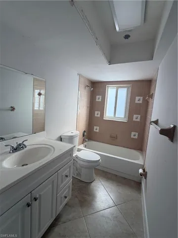 Full bath with  shower combination and vanity