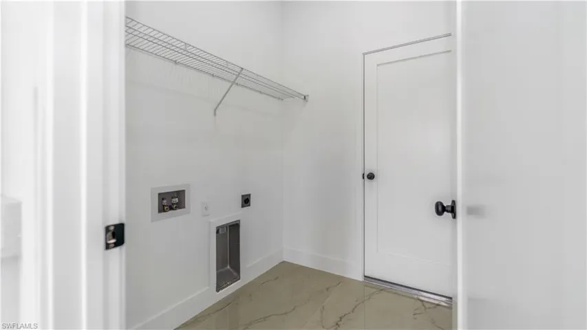 Laundry room with washer and dryer hookup