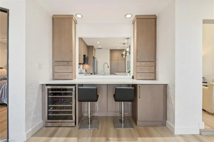 Wine Bar w/cooler at end of kitchen