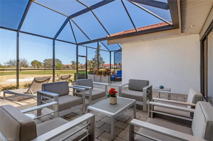 Lanai furniture with screened cage.
