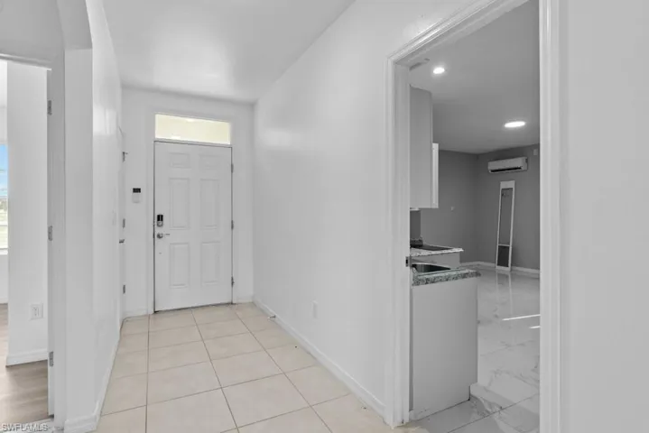 Foyer entrance with an AC wall unit