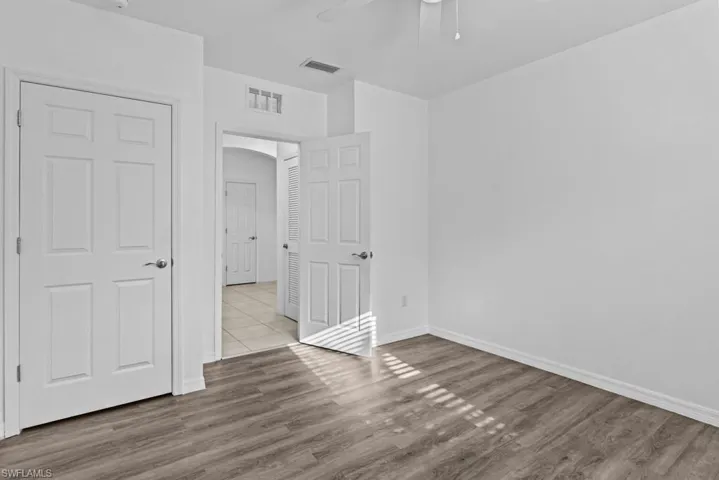 Spare room featuring light hardwood / wood-style flooring and ceiling fan