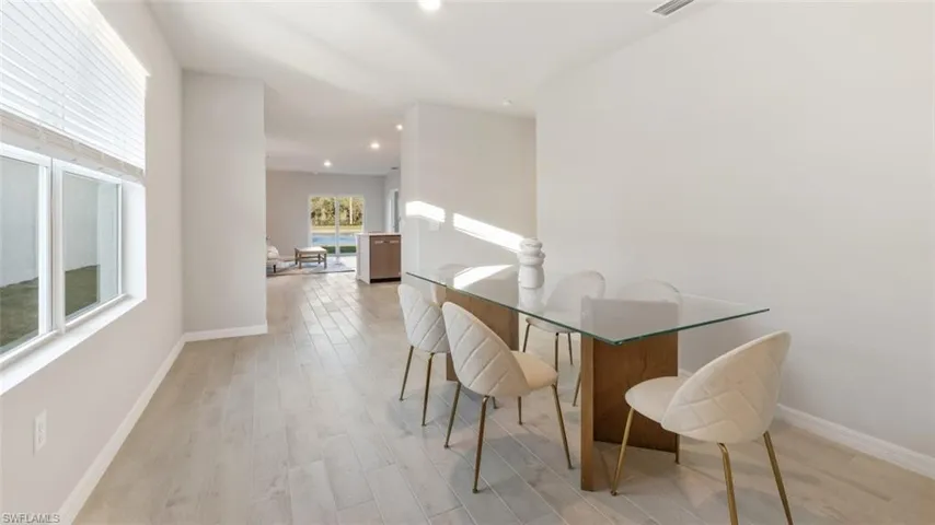 Dining space featuring light wood-type flooring