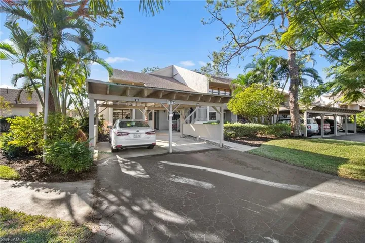 View of front of home featuring a carport