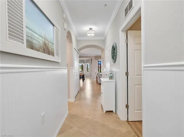Front Hallway with Arches & Crown Molding