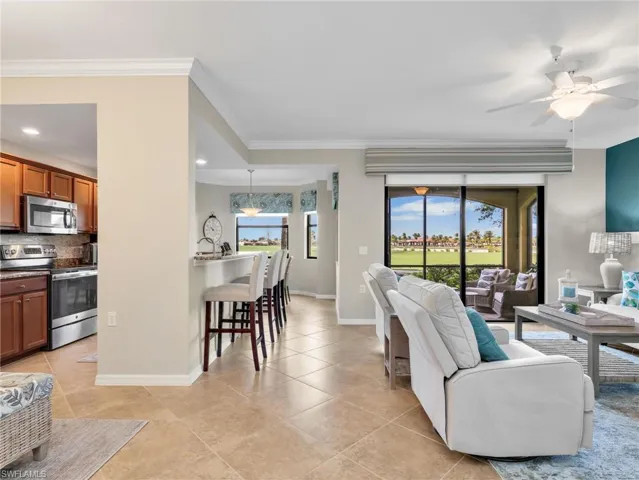 Living Room, Screened In Lanai with Golf Course View, Kitchen with Breakfast Bar and Eat In Kitchen