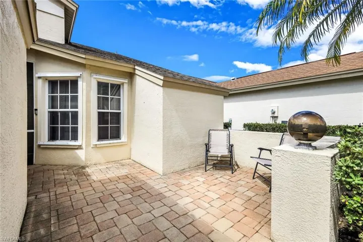 Front of home features a large patio area.
