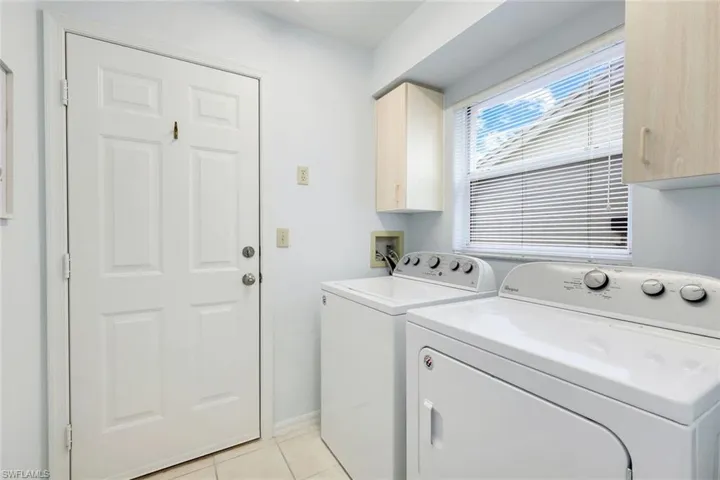 Laundry room is just off the kitchen.