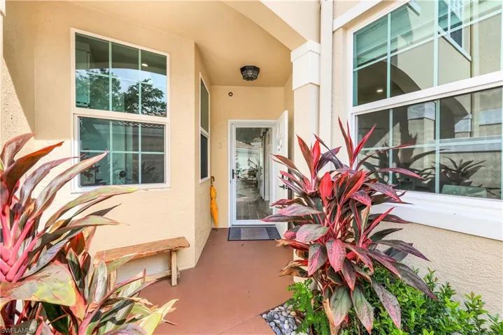 Welcome Home! Front door open and Glass Door allowing natural light.