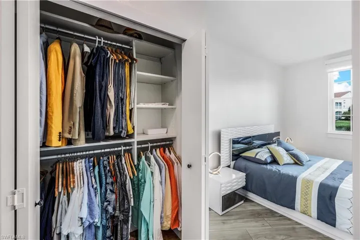The second primary bedroom closet with custom built-ins!