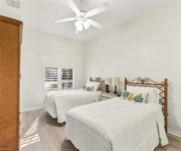 Bedroom featuring light wood finished floors and ceiling fan