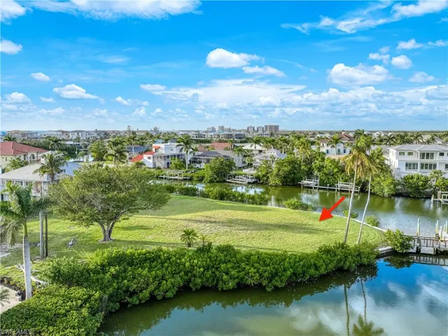 Aerial view of residential area with a large body of water