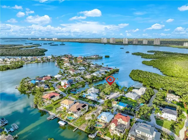 View of urban area featuring nearby suburban area and a large body of water