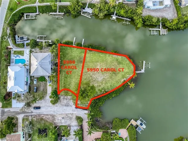 View of property location with property parcel outlined and a large body of water