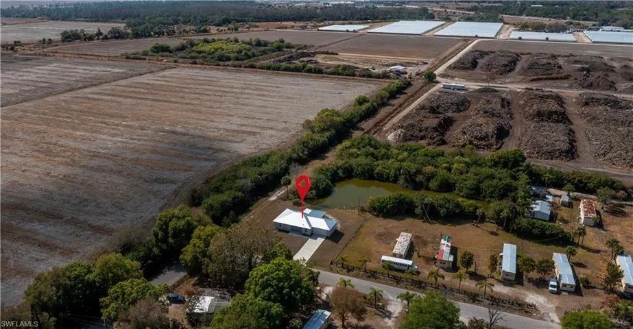 Aerial view of sparsely populated area with abundant farmland