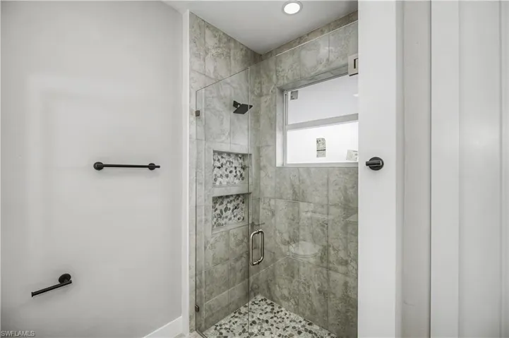 Bathroom with a stall shower