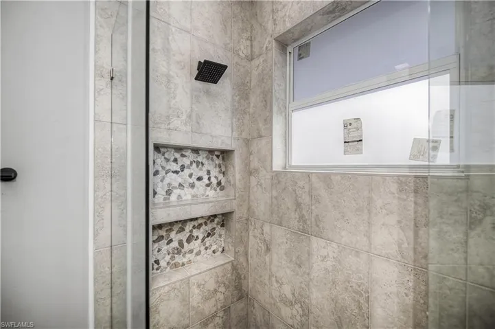 Bathroom view of tiled shower