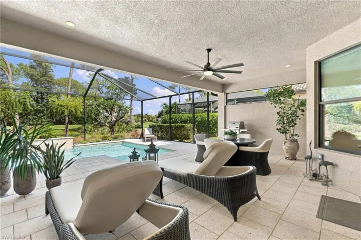 Unwind poolside with peaceful preserve views and glimpses of the golf course beyond.
