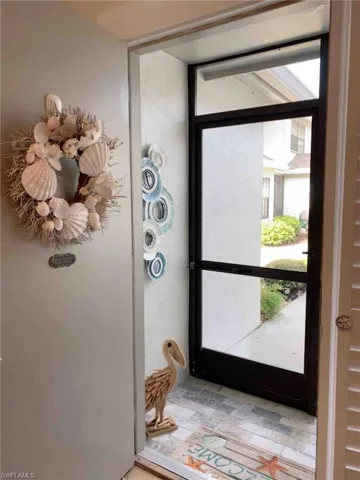 Doorway with wood finished floors